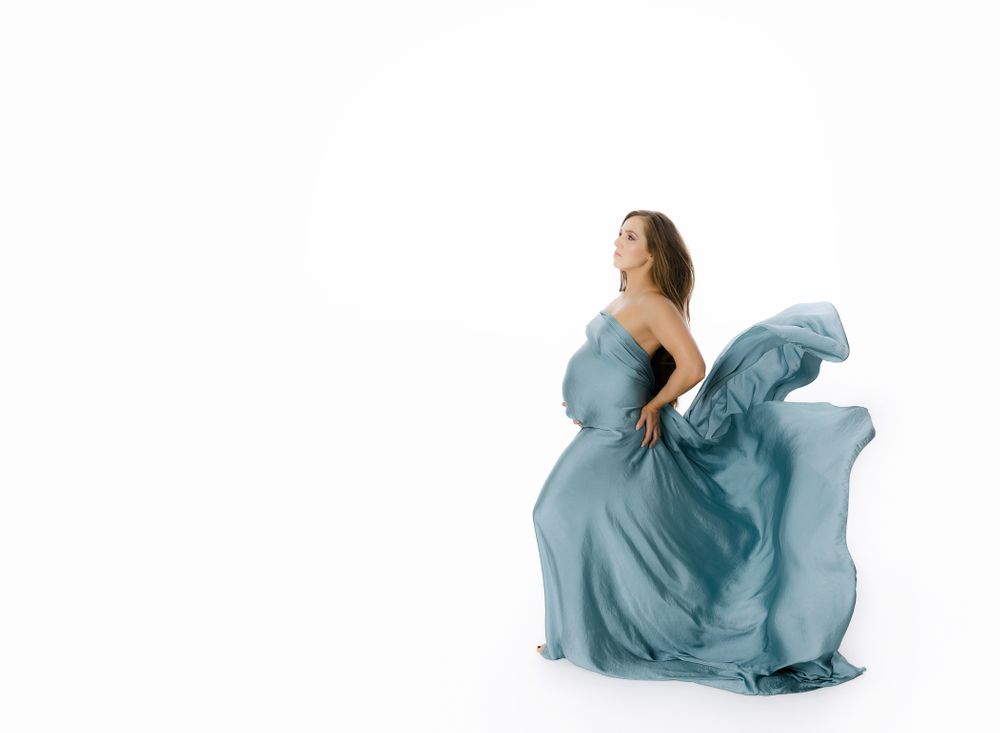Austin Maternity Photography fine art blue fabric drape with train toss