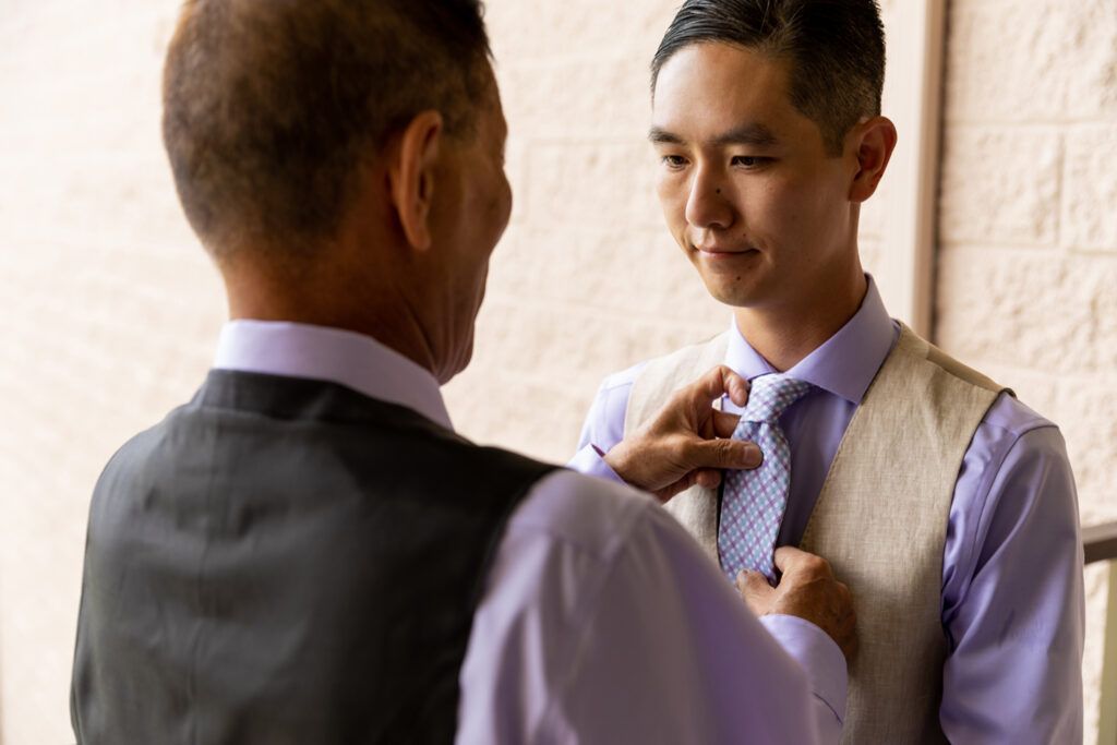 groom and his fathers prepping