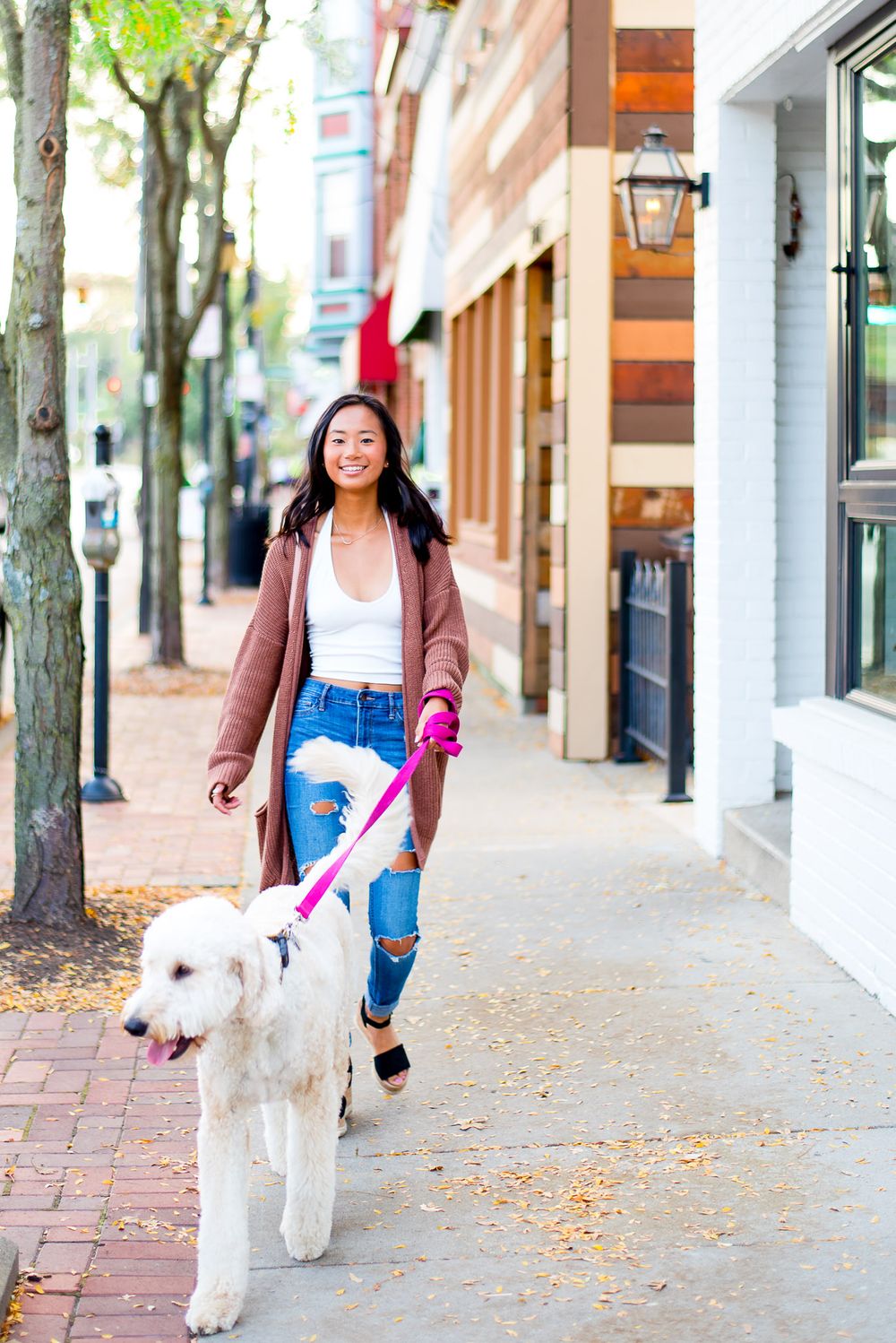 high school senior walking her dog near Bean and Barley in Cincinnati, OH