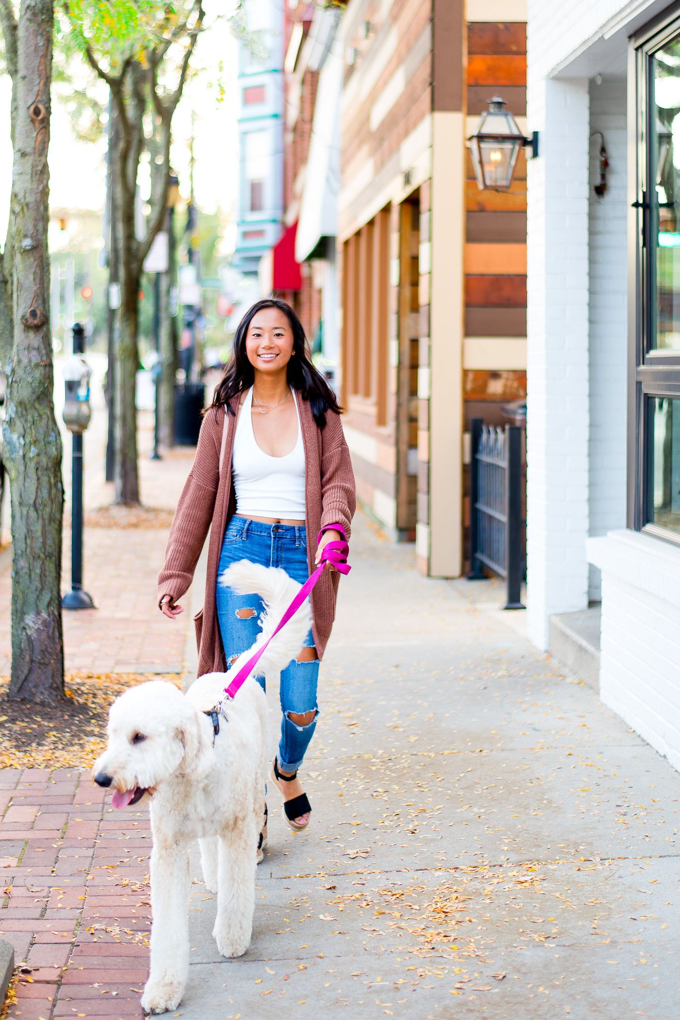 high school senior walking her dog near Bean and Barley in Cincinnati, OH