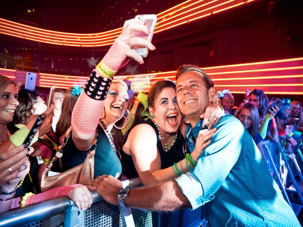 Event Photography - Pat Sharp with fans in a theatre.