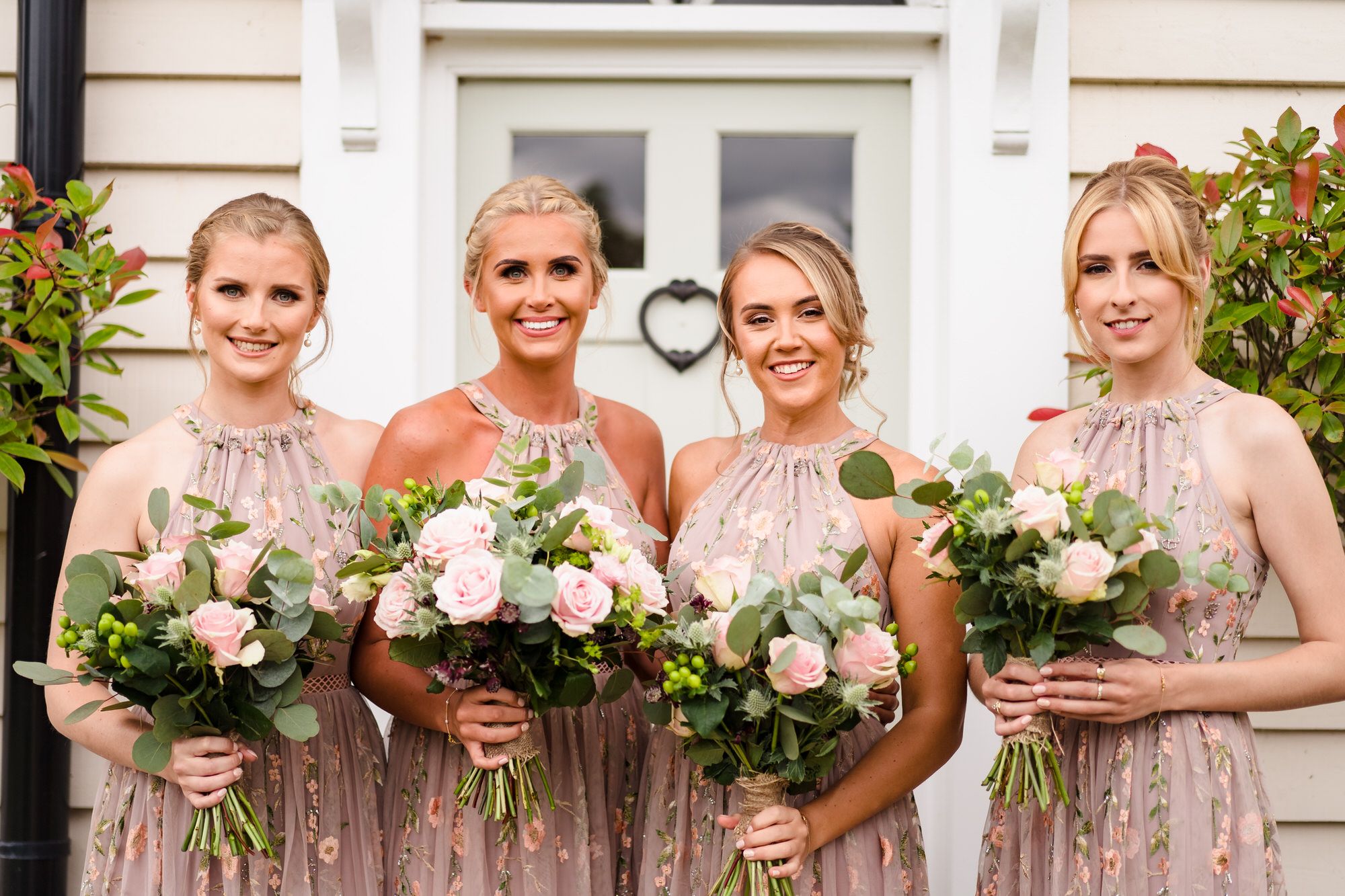 Bridesmaids in pink at Blake Hall Ongar Essex Wedding