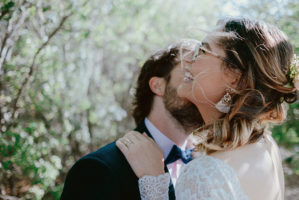 Emotional couple portrait in the Canadian Rockies with mountain backdrop | Calgary wedding photographers.