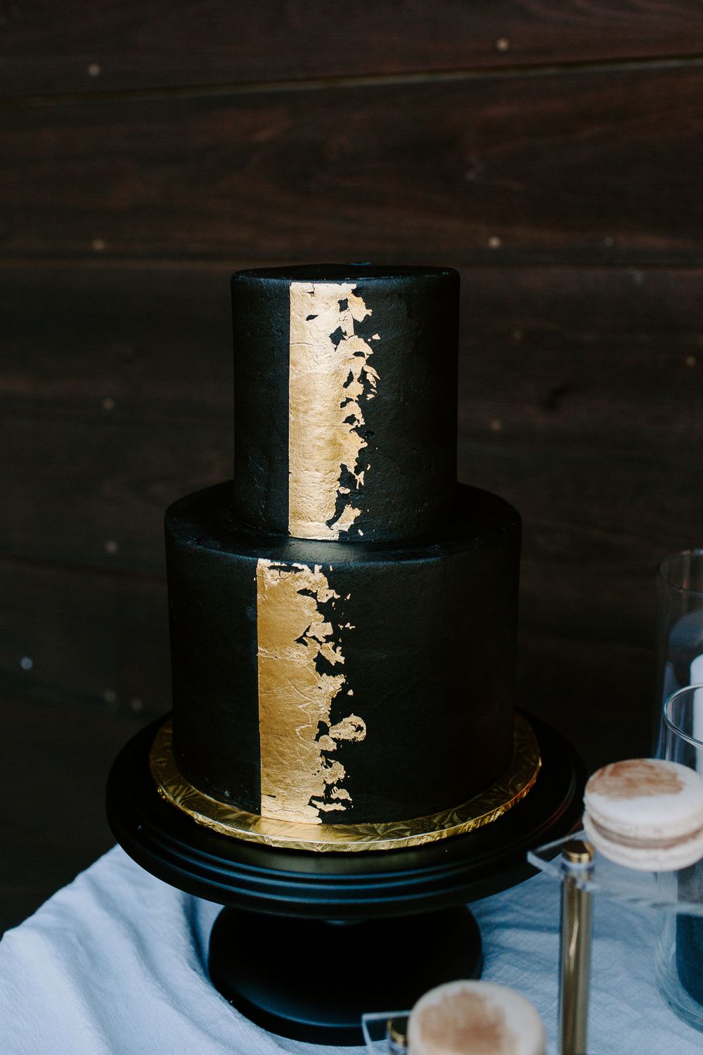 gold and black three layer cake from elopement