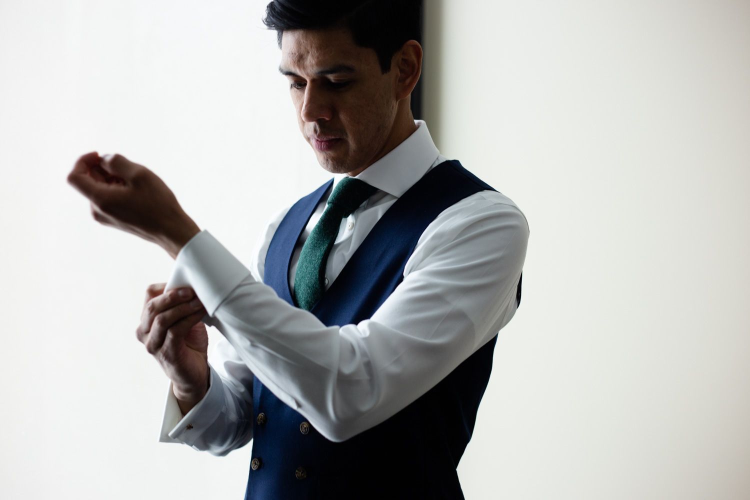Groom getting ready for a Hudson Valley winter wedding