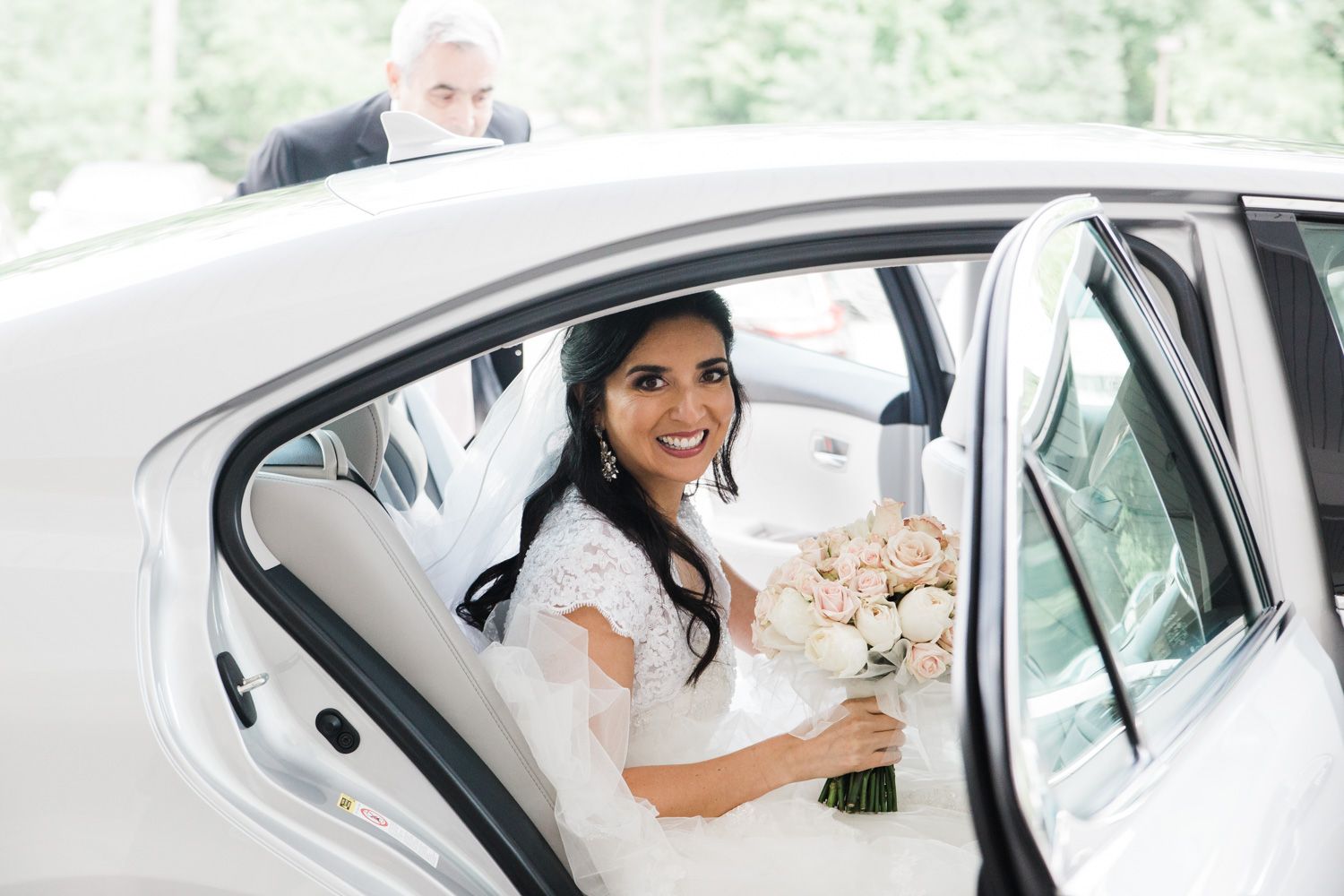 Hudson Valley bride pulling up to ceremony in car