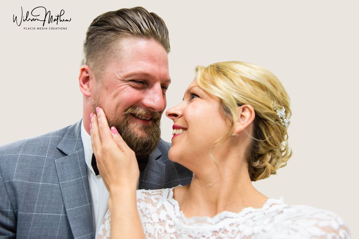Her hand is on his beard- Bride and Groom