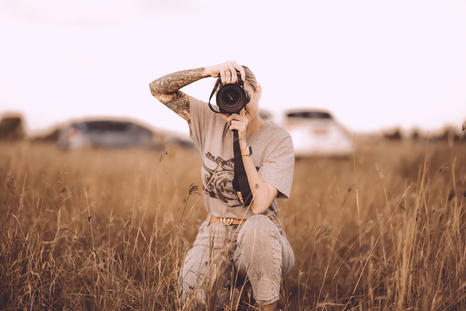 Karlene Jacobsen Photographer in a field at sunset in Townsville