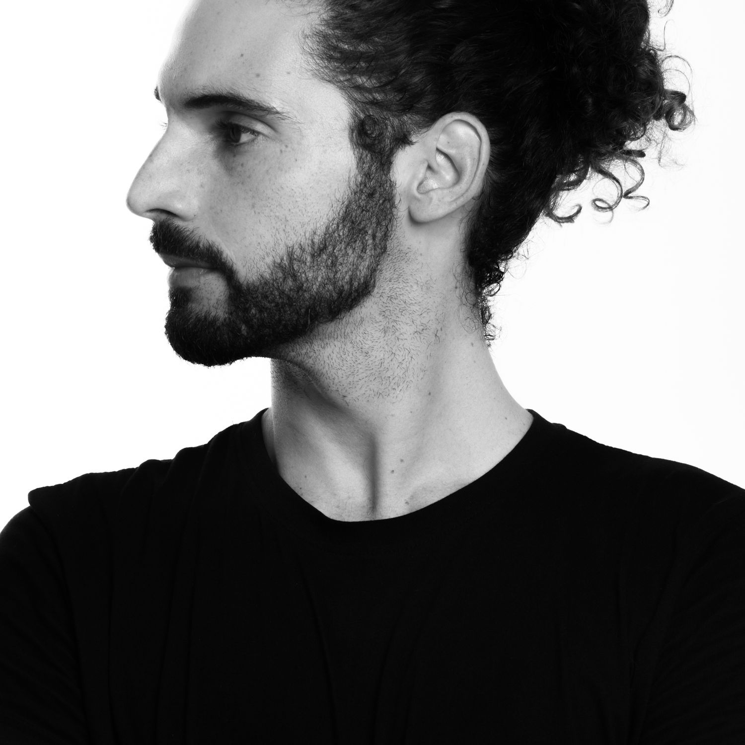 A self portrait of Logan C Thomas that he used to demonstrate 4 lighting setups he uses for corporate headshots.