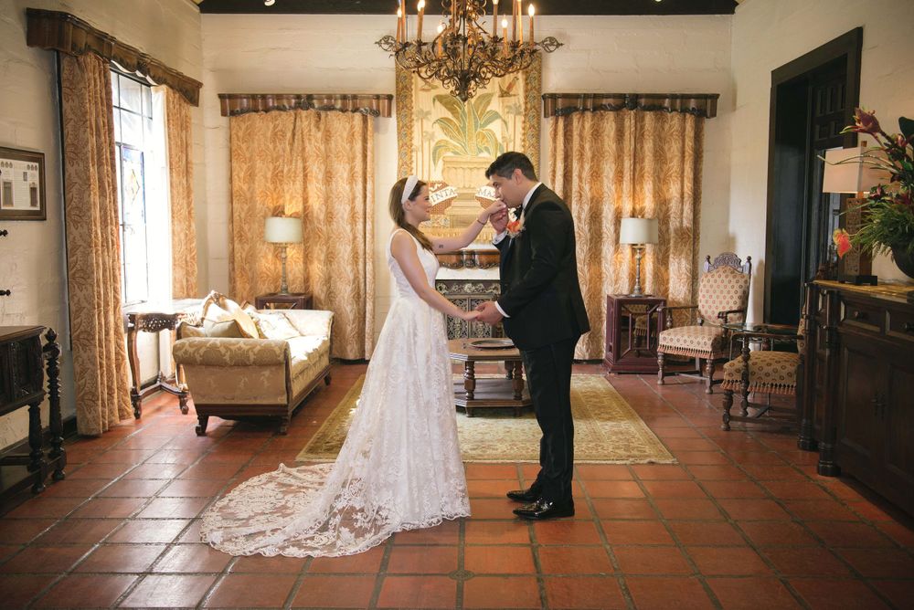Groom kissing the bride hand. Mcallen wedding photographer. quinta mazatlan