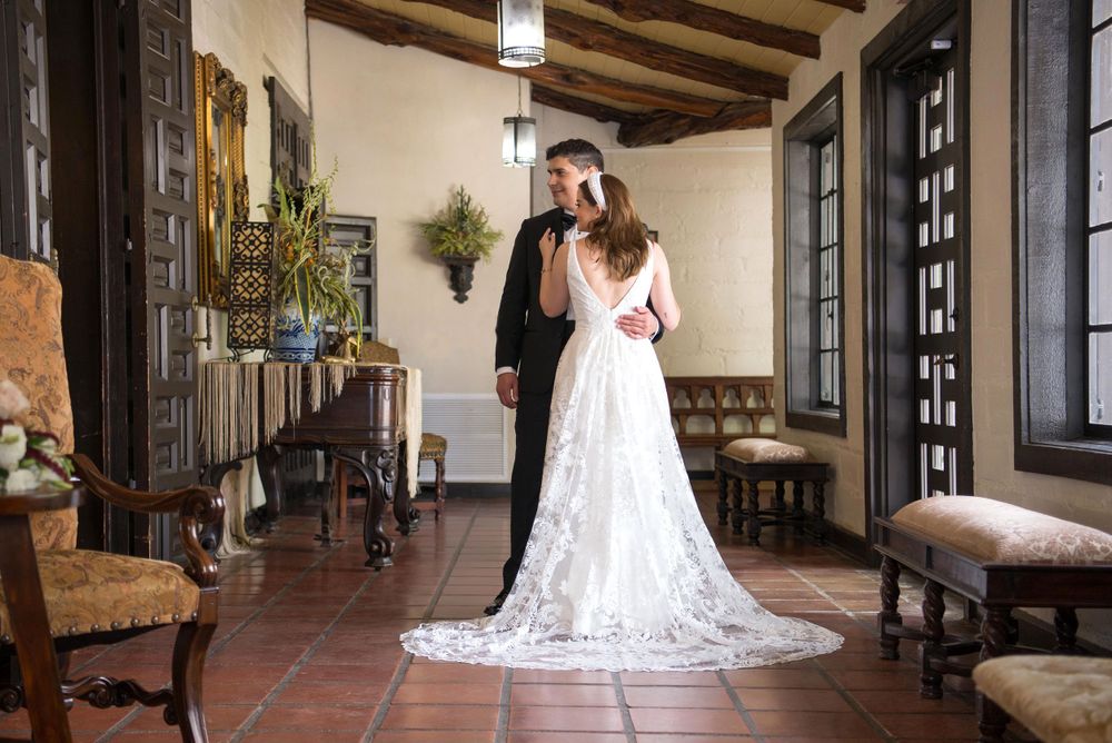 bride and groom posing at quinta mazatlan in McAllen TX