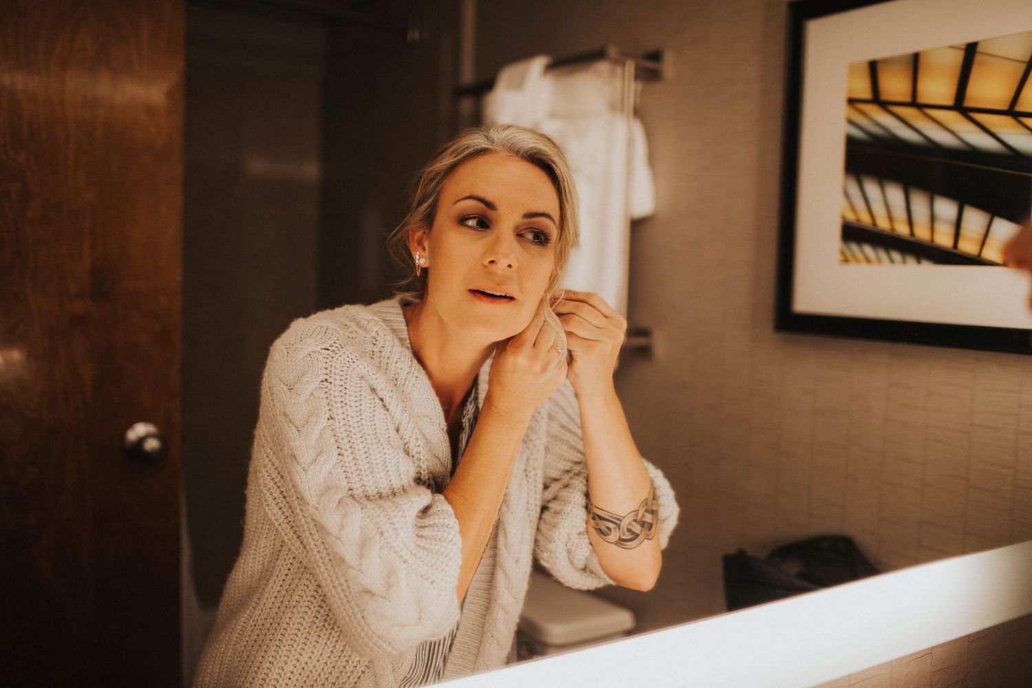 Bride getting ready in hotel for Greenville, NC microwedding for LGBT couple.