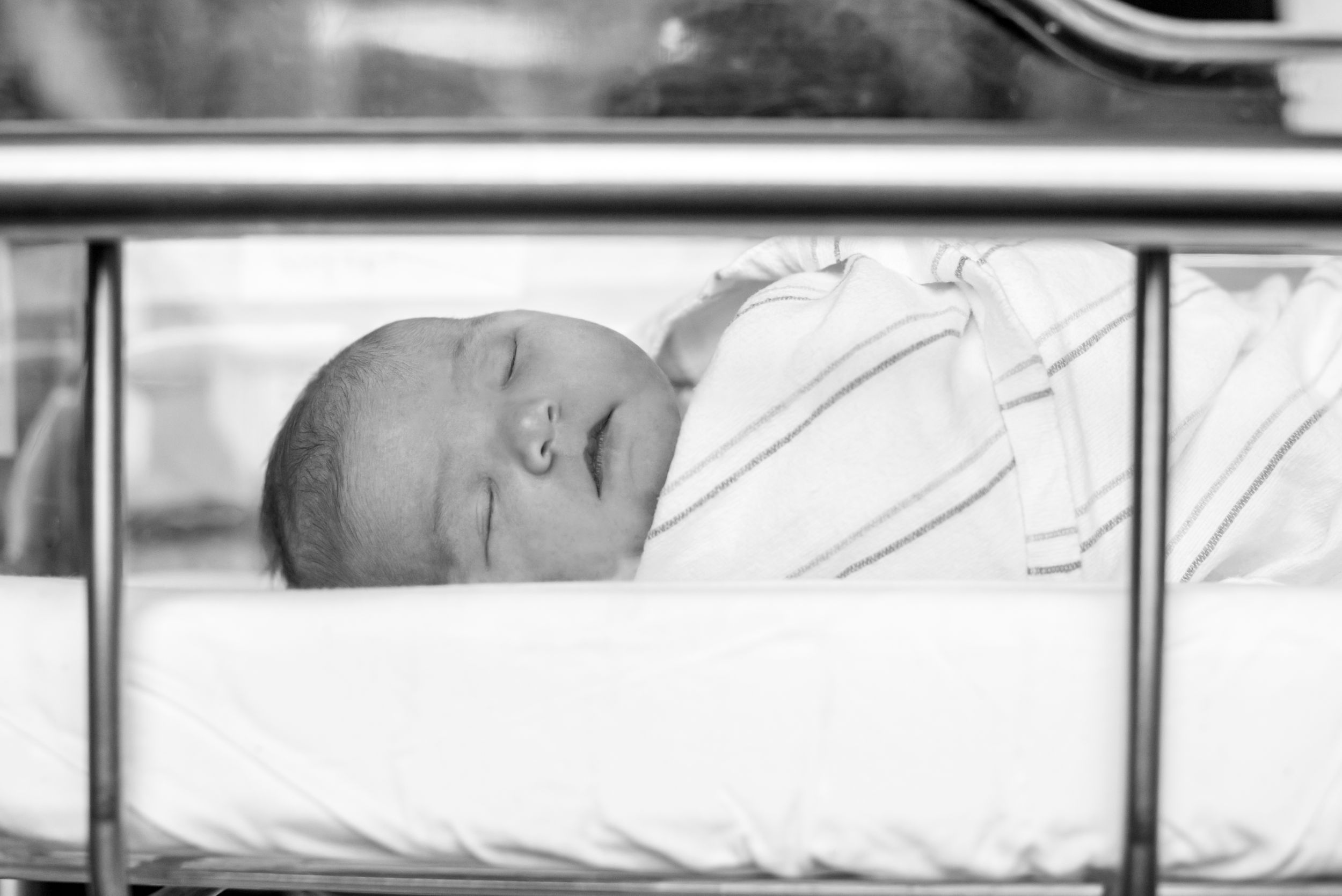 heidi harting captures newborn sleeping in hospital bassinet, plymouth MA