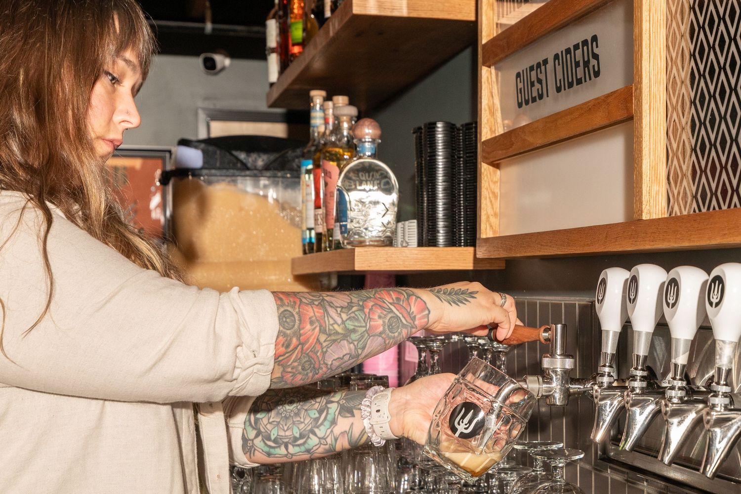 Wayfinder Highlands interior shot of beer being poured
