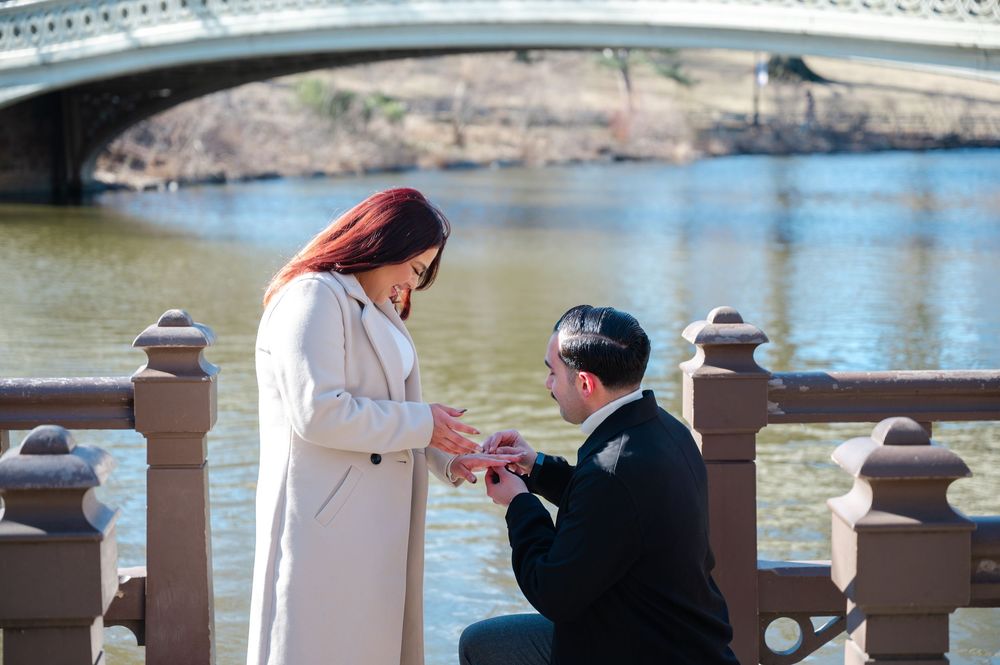 Emotional proposal moment in Central Park captured by NYC proposal photographer