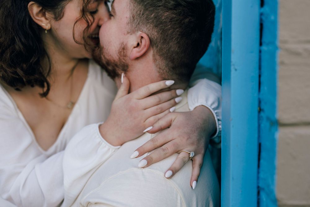 An intimate close-up of a couple sharing a tender moment together.