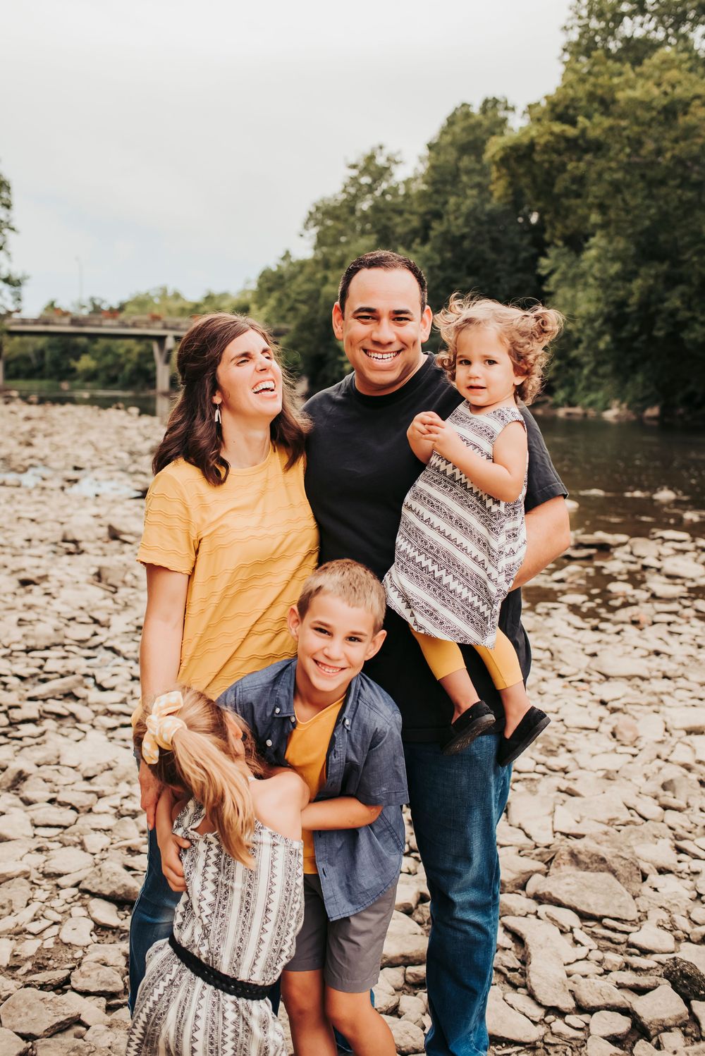 family laughed together at Nisbet park in downtown loveland, ohio