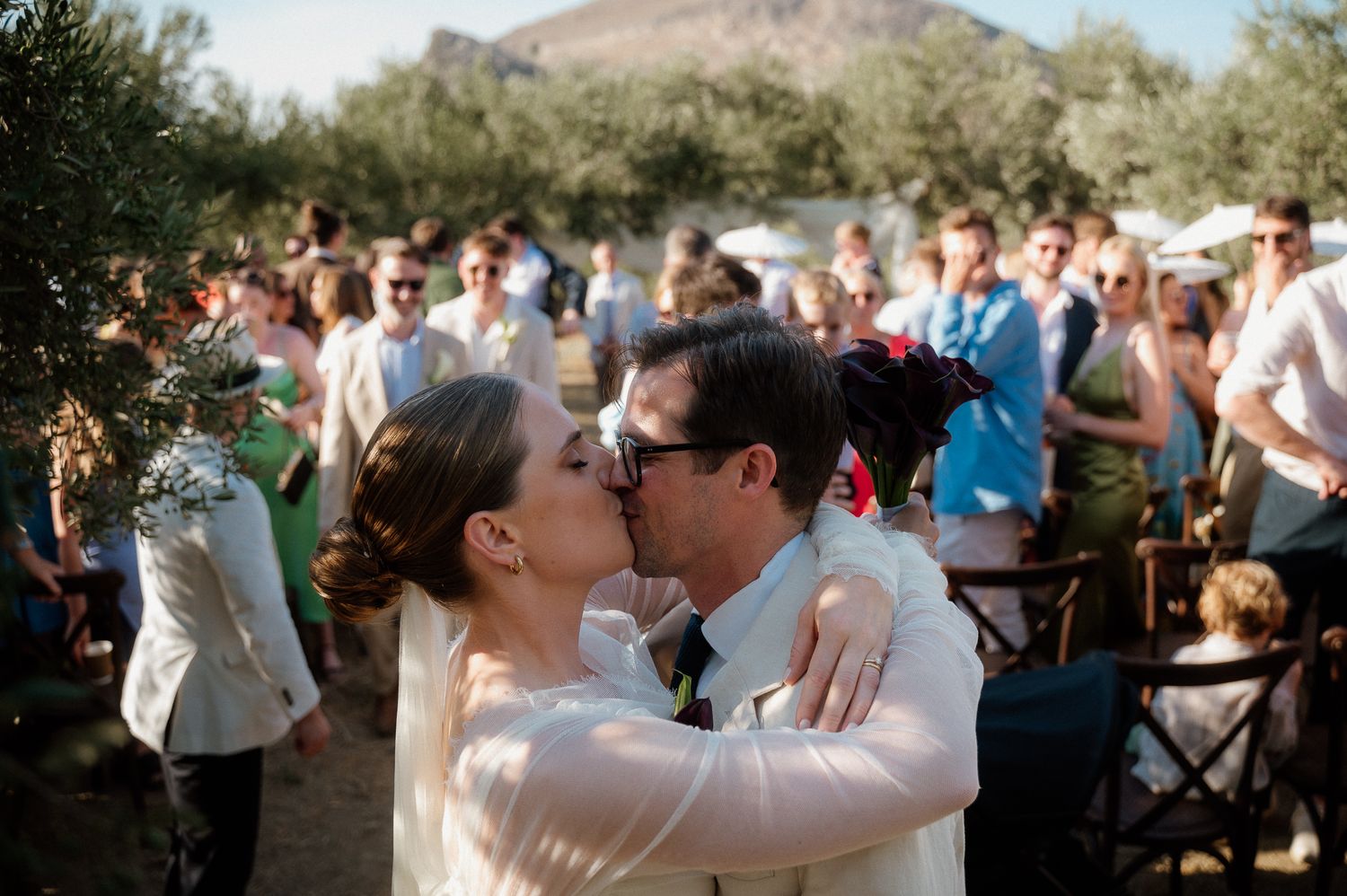 A documentary photo of a bride and groom after their wedding ceremony in Chania, Crete