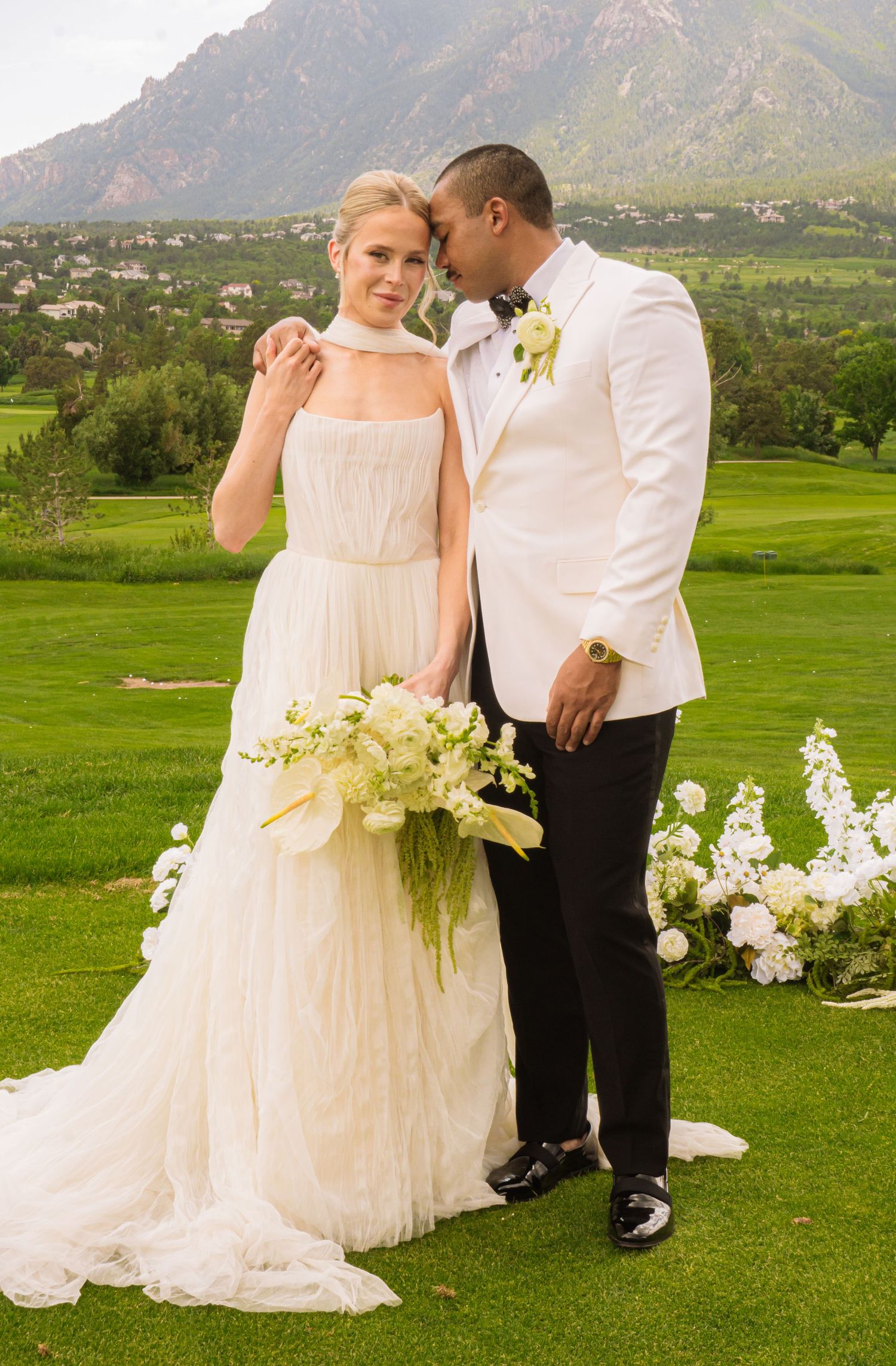 Colorado Springs Wedding Photographer. Photo of the bride and groom posing.