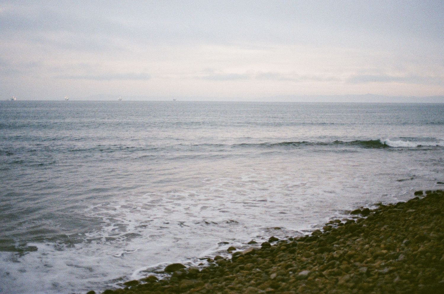 Rainclouds above Montecito coast during romantic proposal setup.