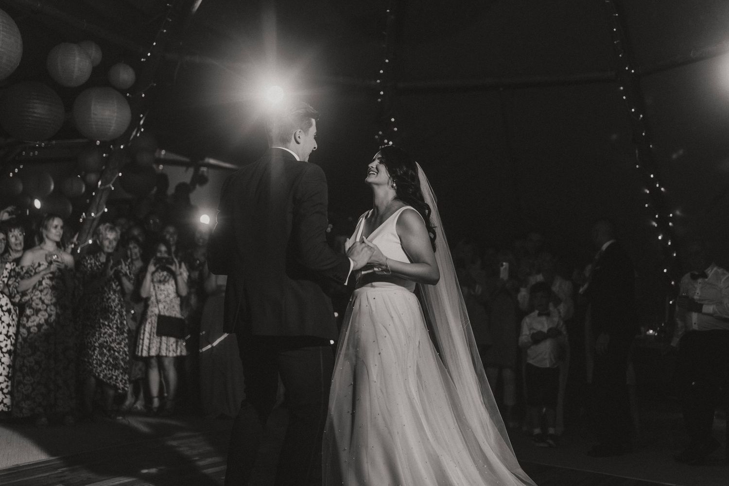 A couple dancing beneath sparkling lights during their first dance at Hirst Priory. Taken by Grimsby photographers.