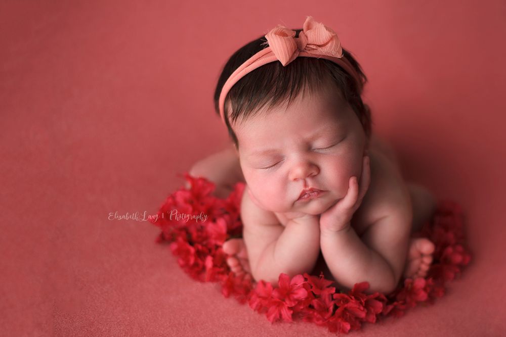 Newborn baby girl froggy pose from Elizabeth Lang Photography in Surrey.
