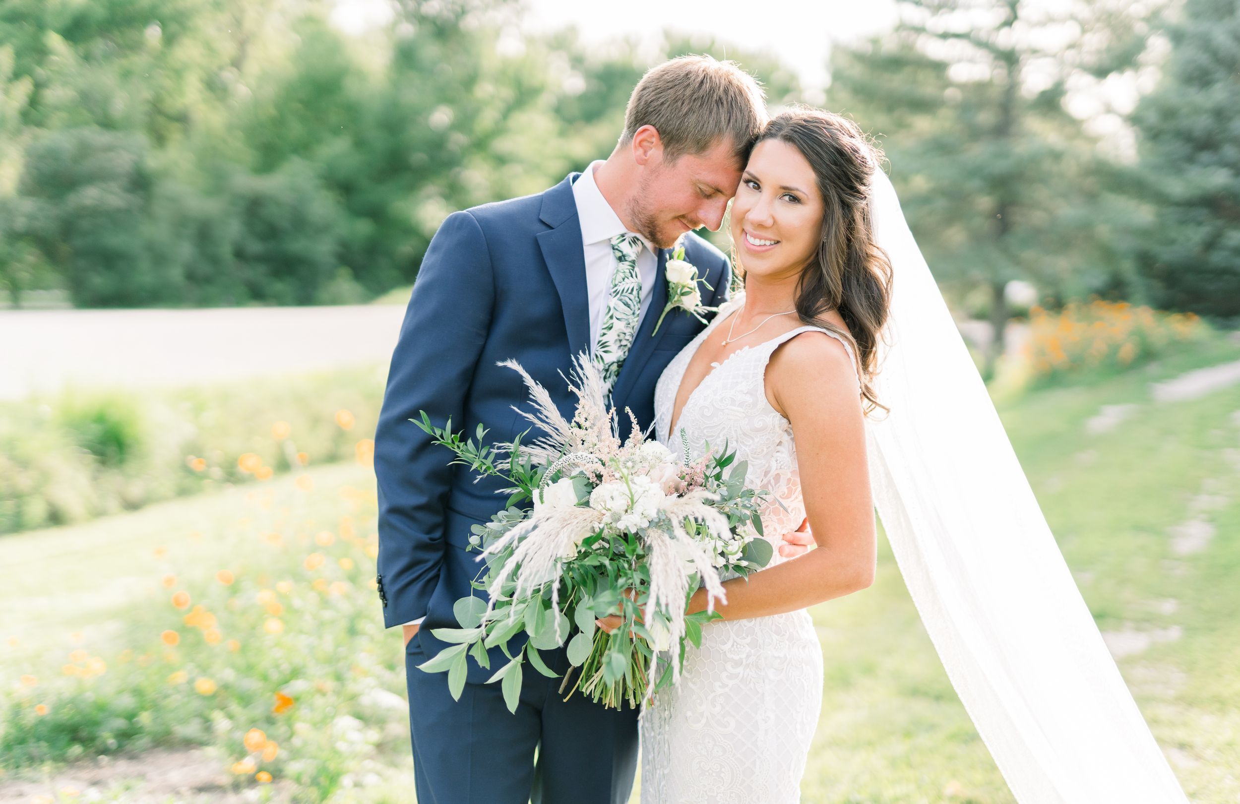 Vineyard photos with white willow events at Prairie Moon Winery wedding in Ames, Iowa