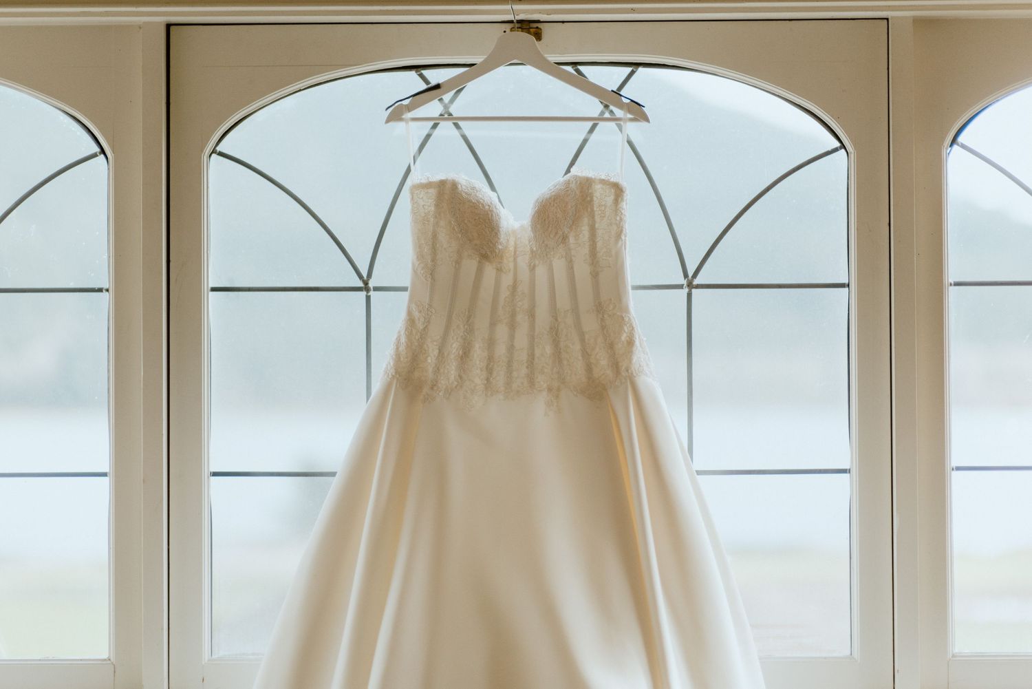 wedding-dress-in-window-rowena's-inn-romantic-wedding-venue