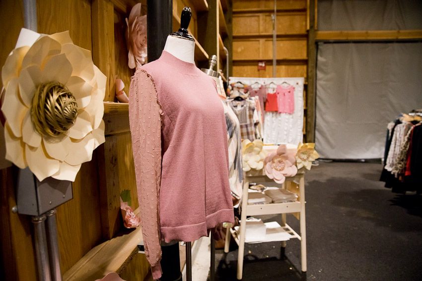 Pinology Puyallup Mabel McKinley Boutique Booth display mannequin with pink shirt on by big paper flower