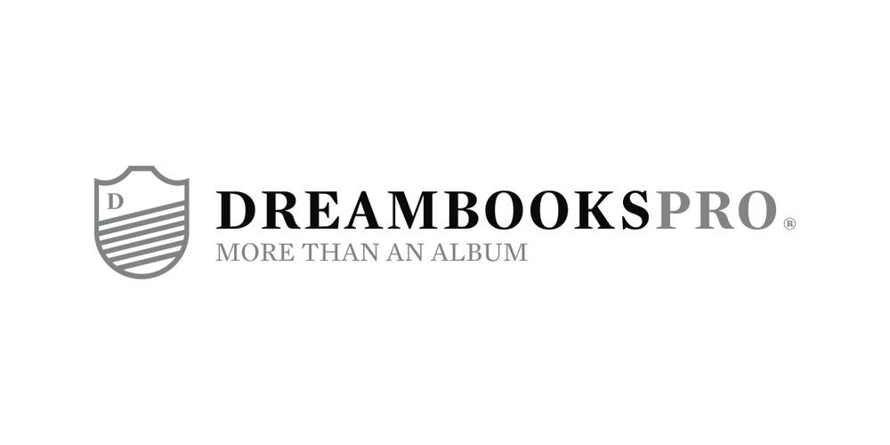 DreamBooksPro company logo with shield design and tagline.