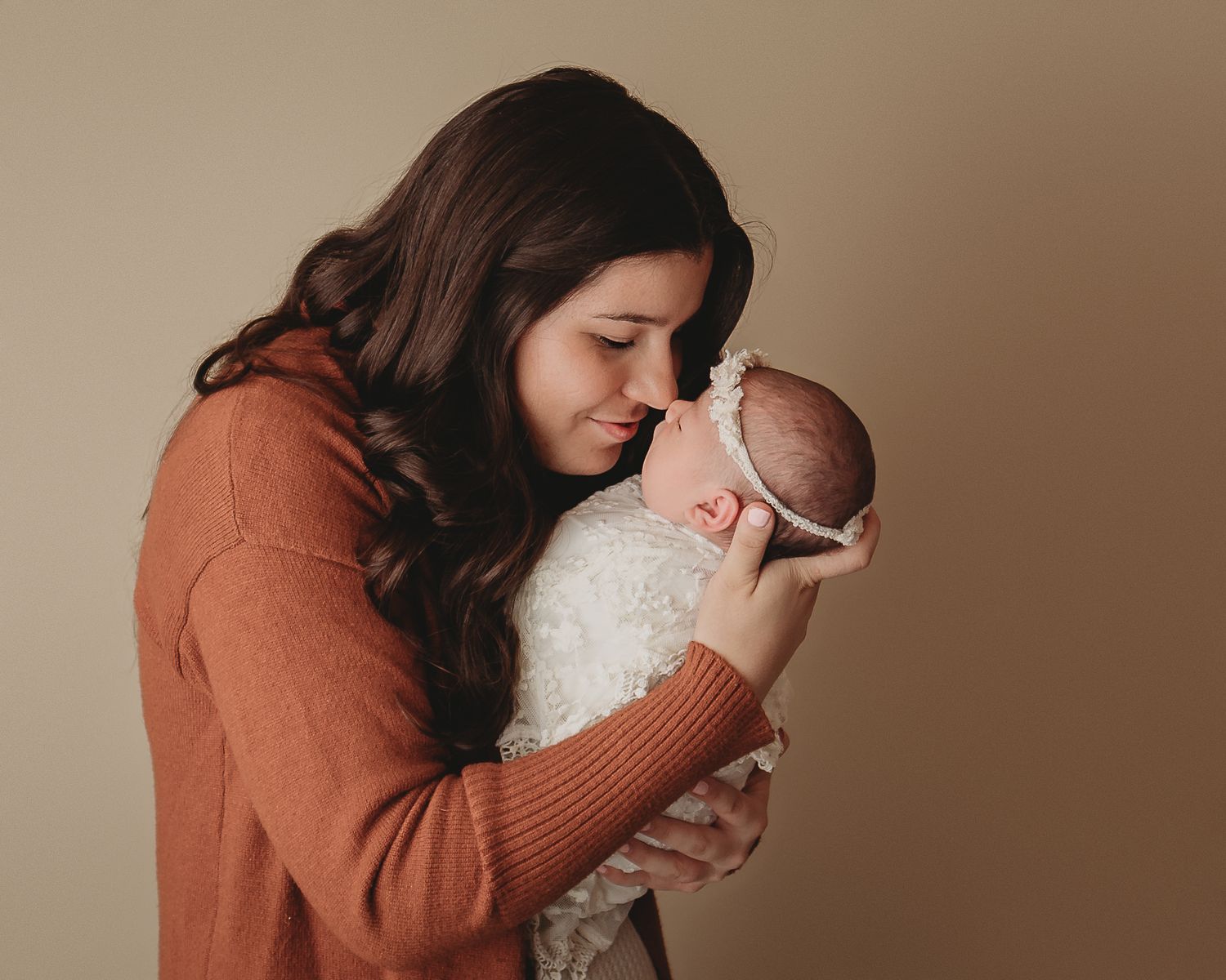 Professional newborn photo with mom