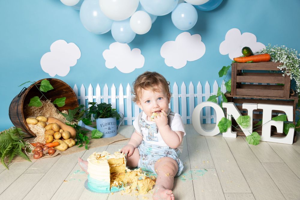 peter rabbit inspired background with a child eating cake