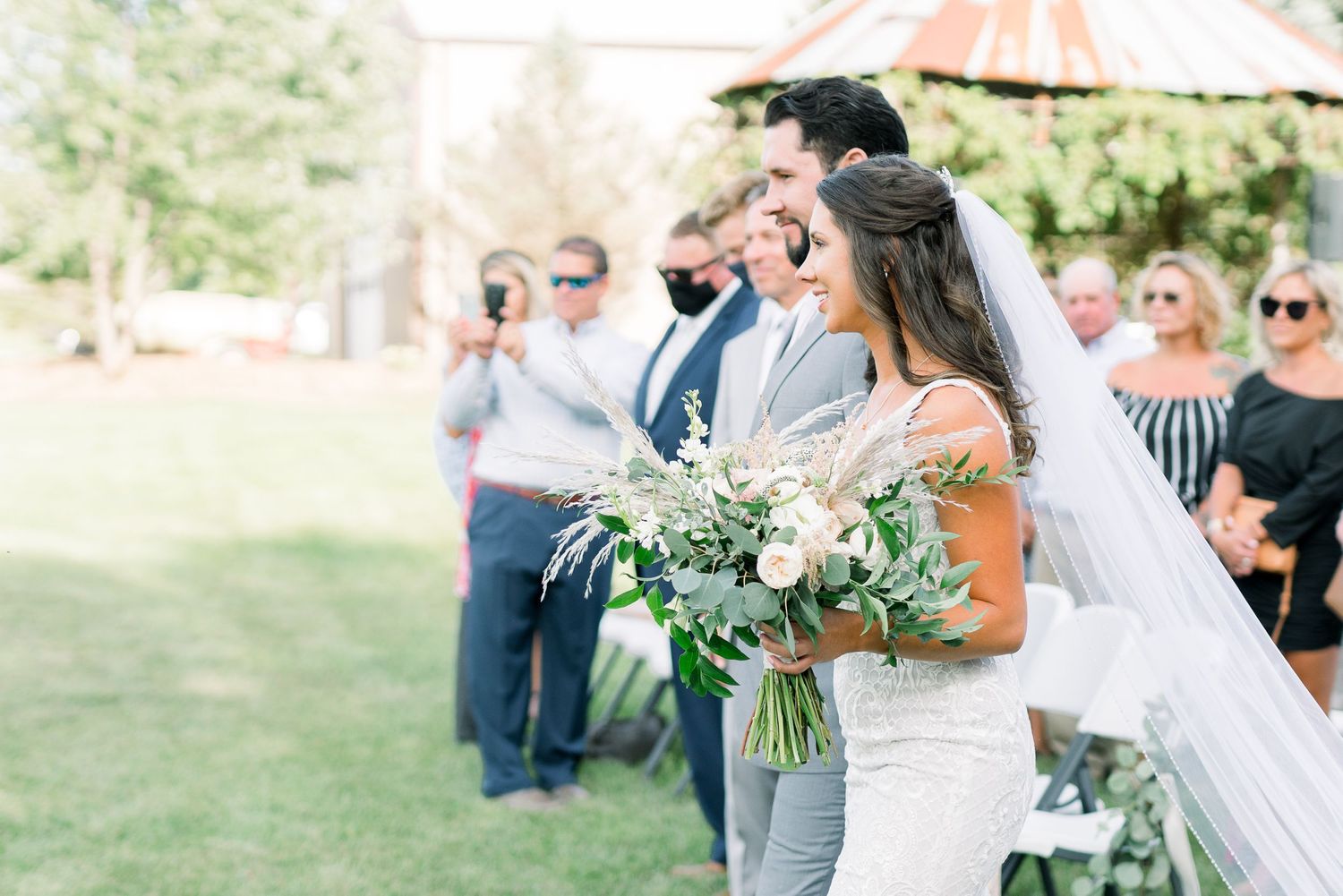 Vineyard photos with white willow events at Prairie Moon Winery wedding in Ames, Iowa