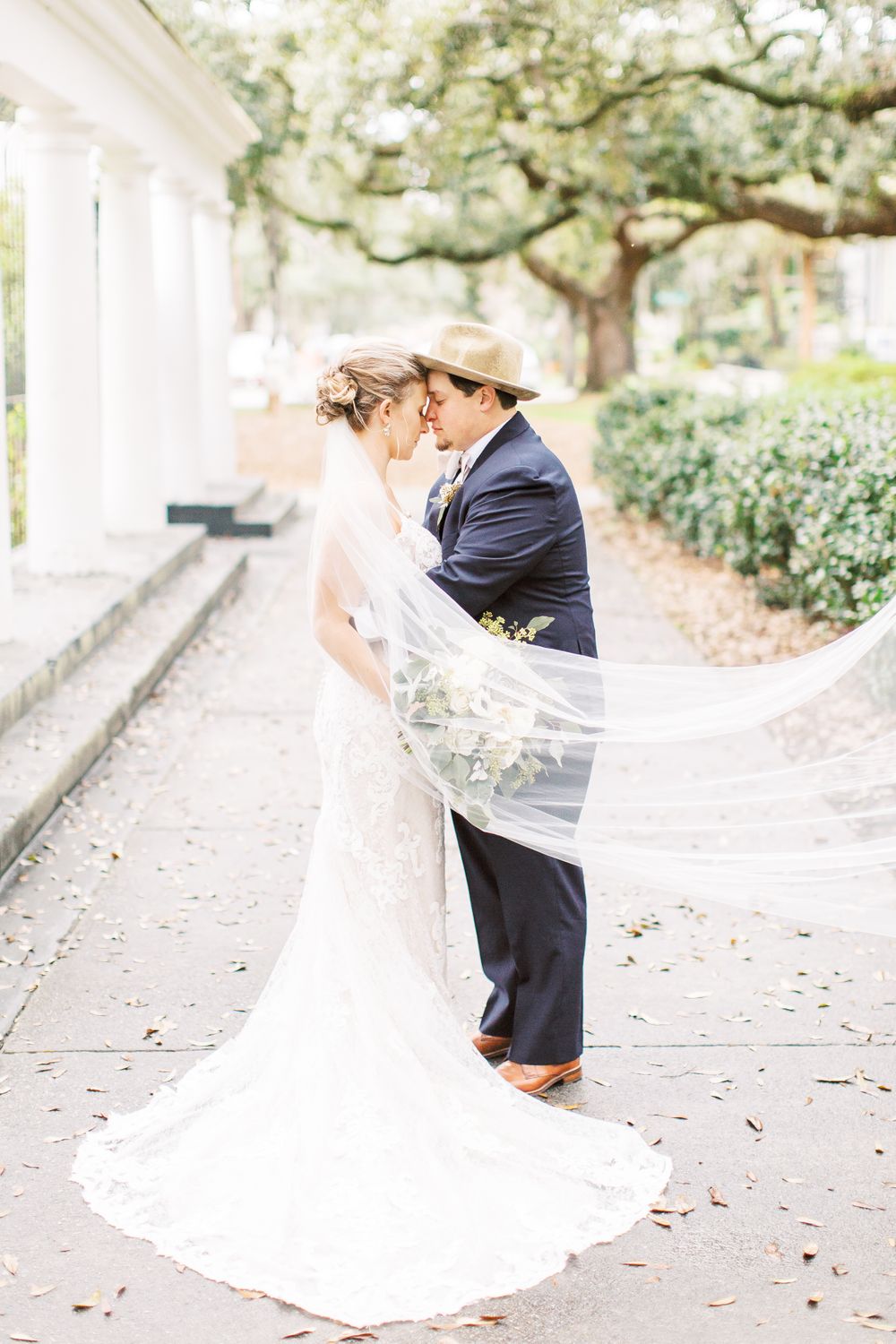 kayley and josh taking couples portraits during their savannah, ga wedding