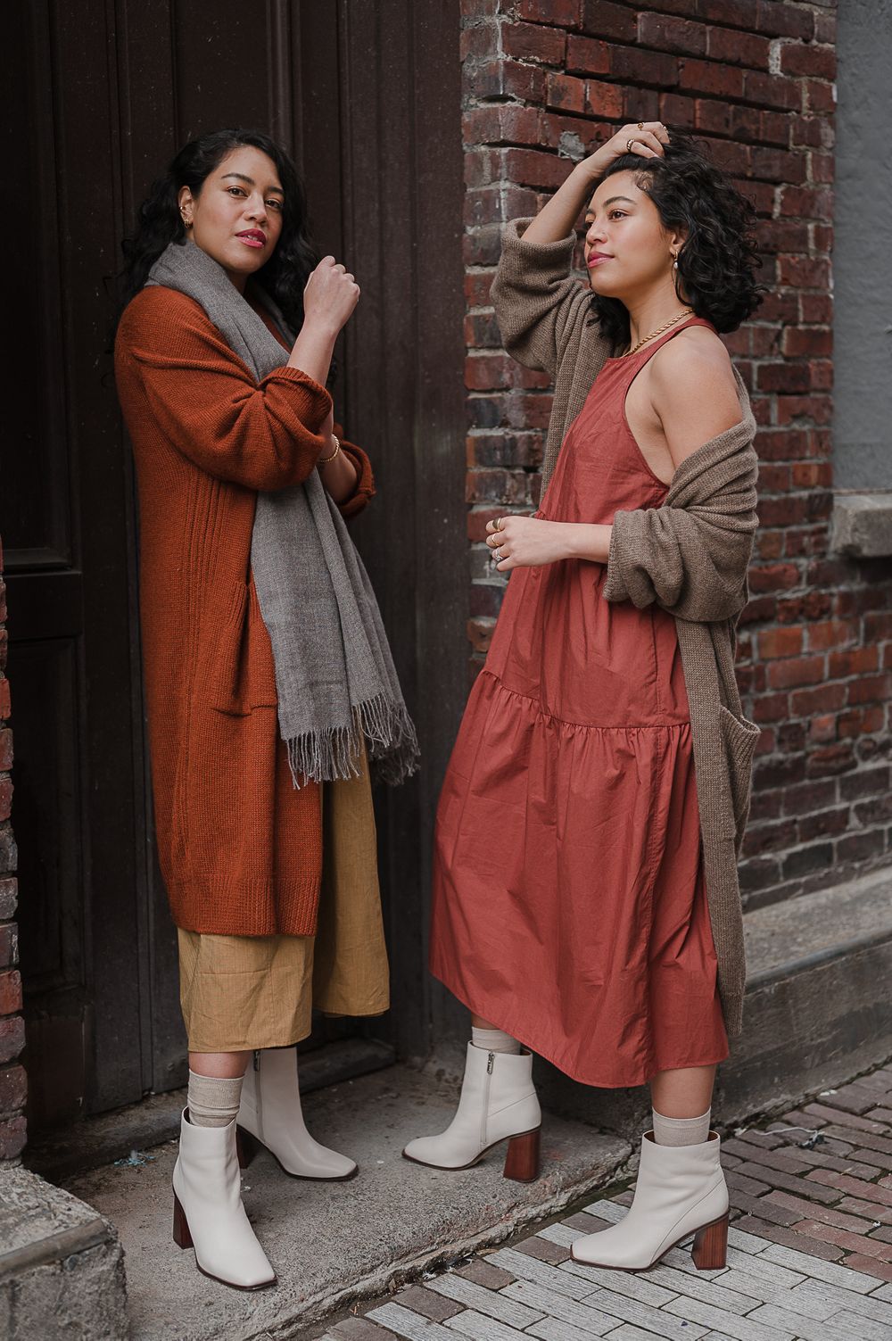 Brand campaign portrait by Tiffany Kelterer of two women standing in brick alley Seattle fashion designers clothing