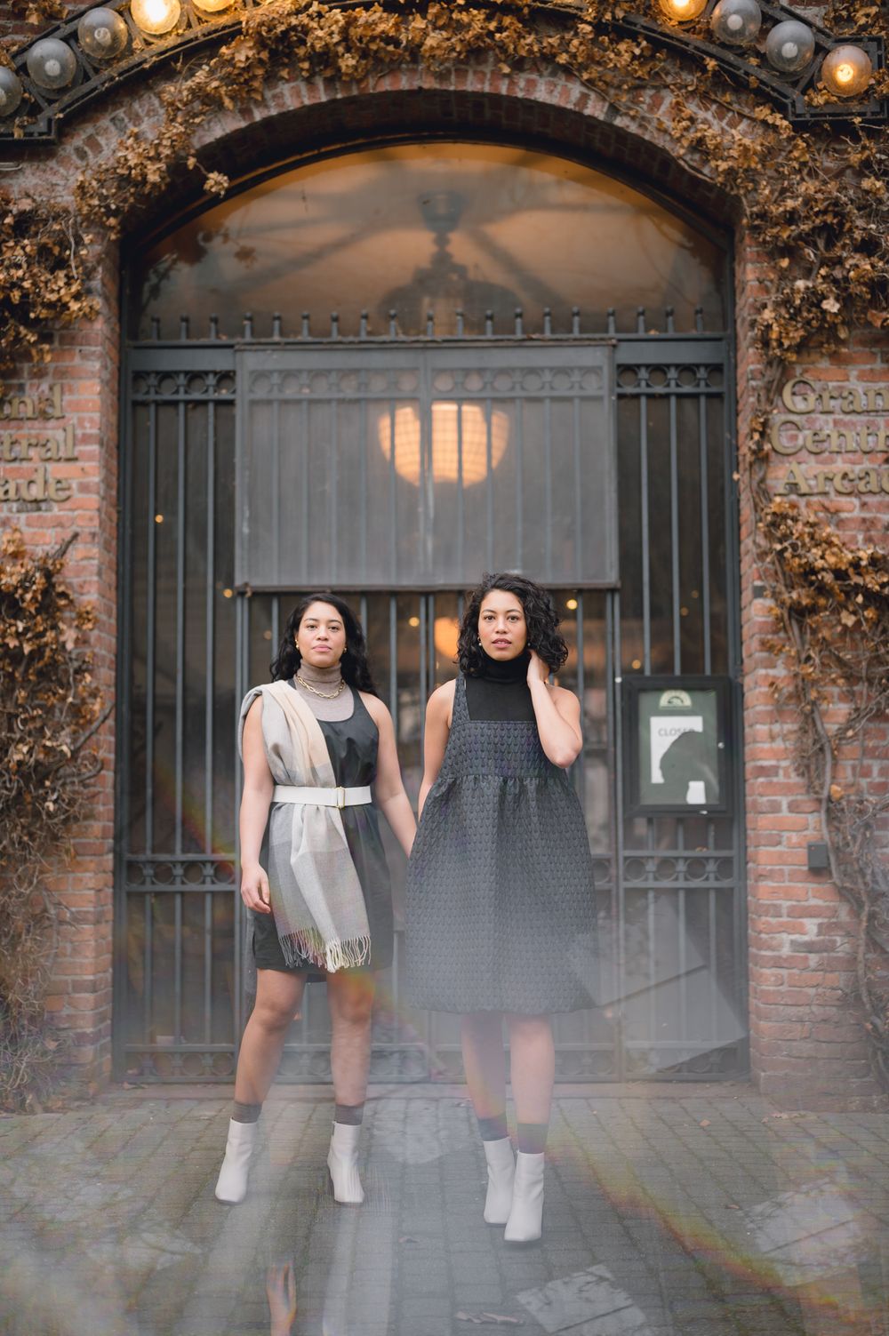 Clothing campaign brand portrait by Tiffany Kelterer of 2 woman in brick alley Pioneer Square Seattle