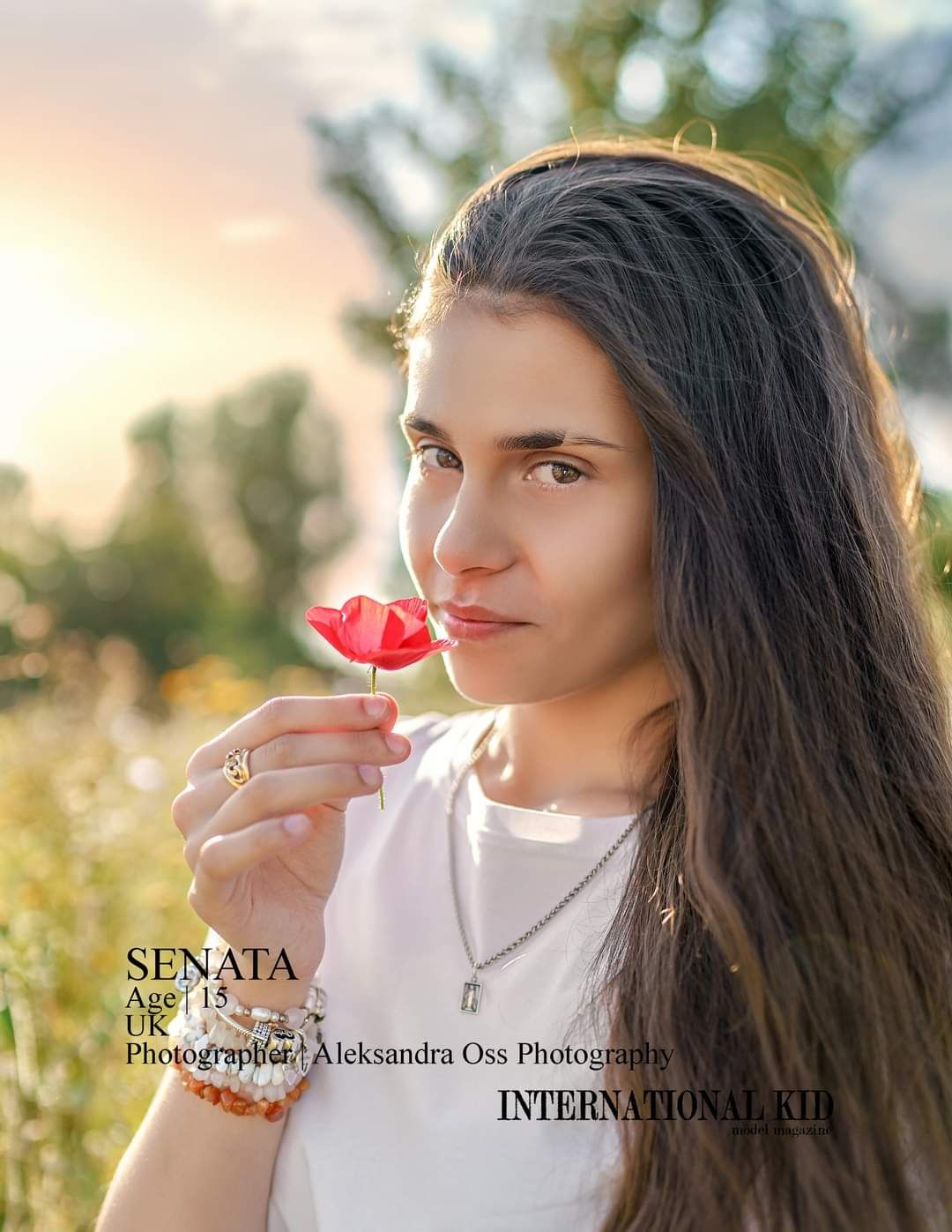 Girl with flower during portrait session in the park