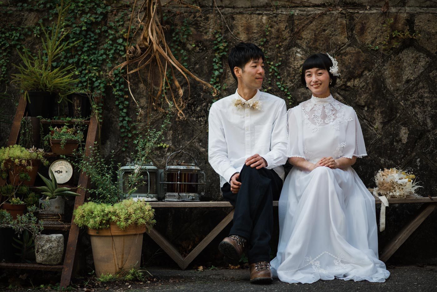 88house hiroshima x harustudio elopement couple sitting on bench