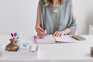 Business photography with woman owned business in white office