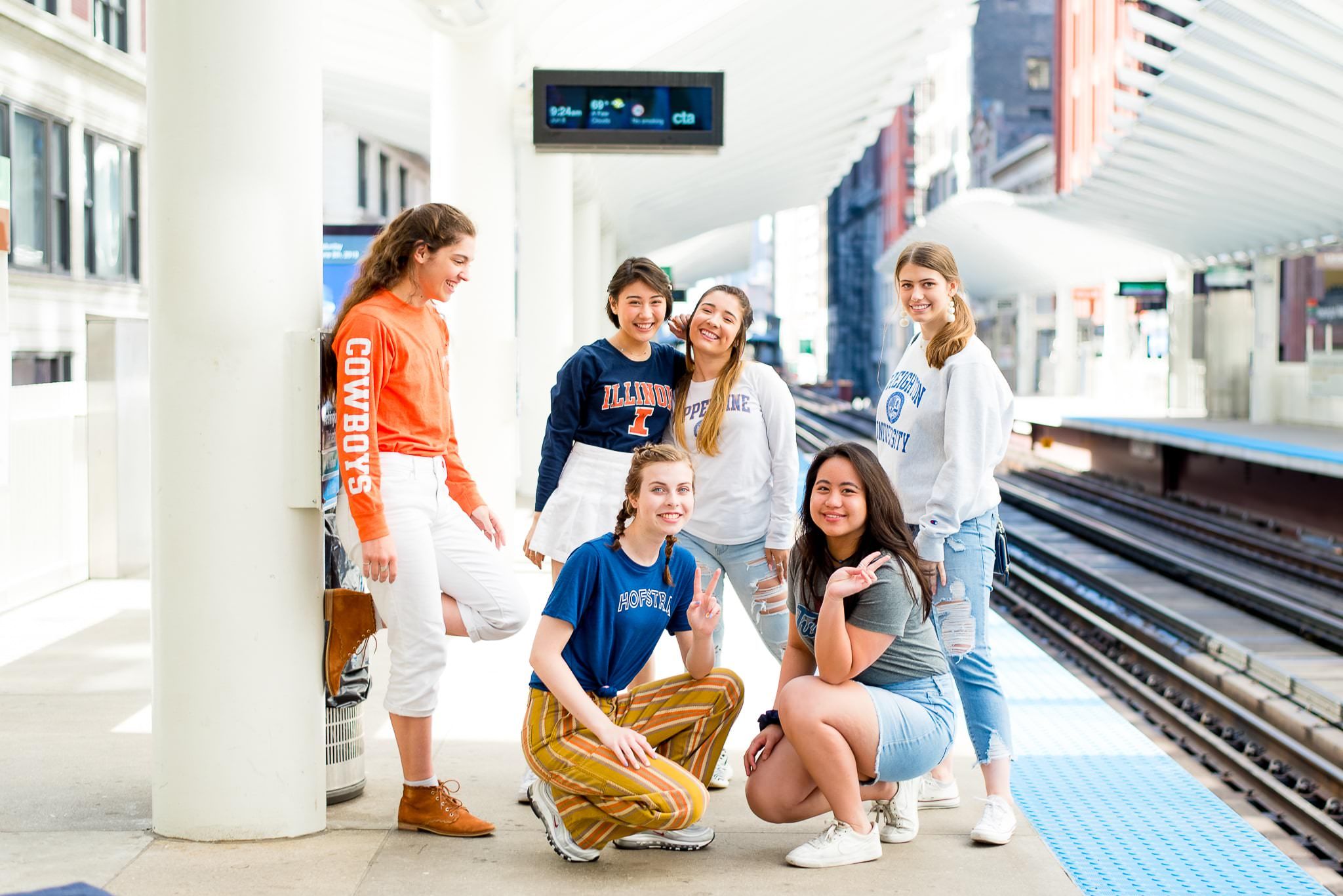 six Chicago seniors at the L station in the loop for chicago senior pictures