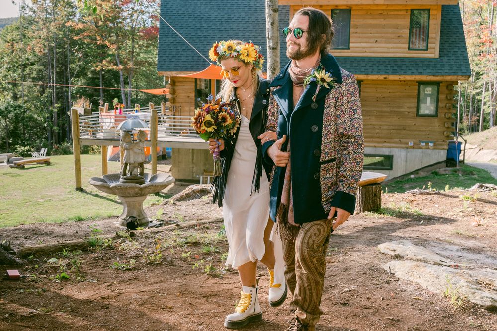 Bride walking to her wedding ceremony with companion