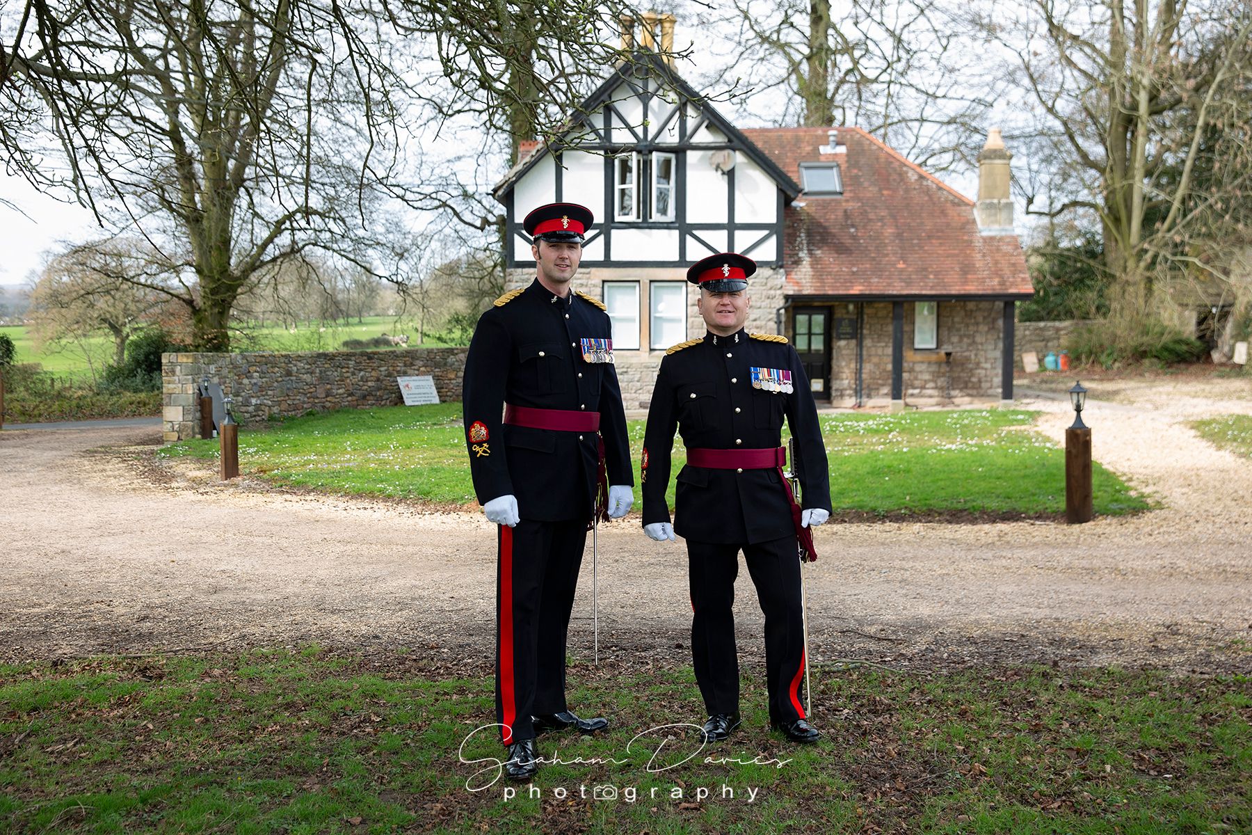 two soldiers groom and best man at the lodge on the grounds of St Tewdrics house before the wedding