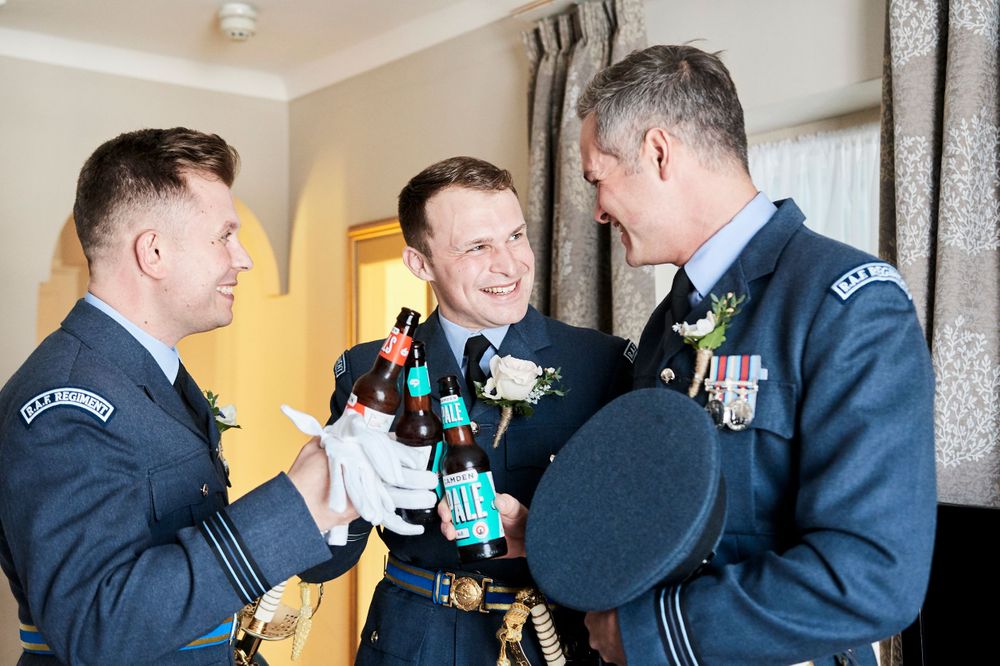 groom gets ready at The Angel, Suffolk. by Suffolk wedding photographer Faye Amare
