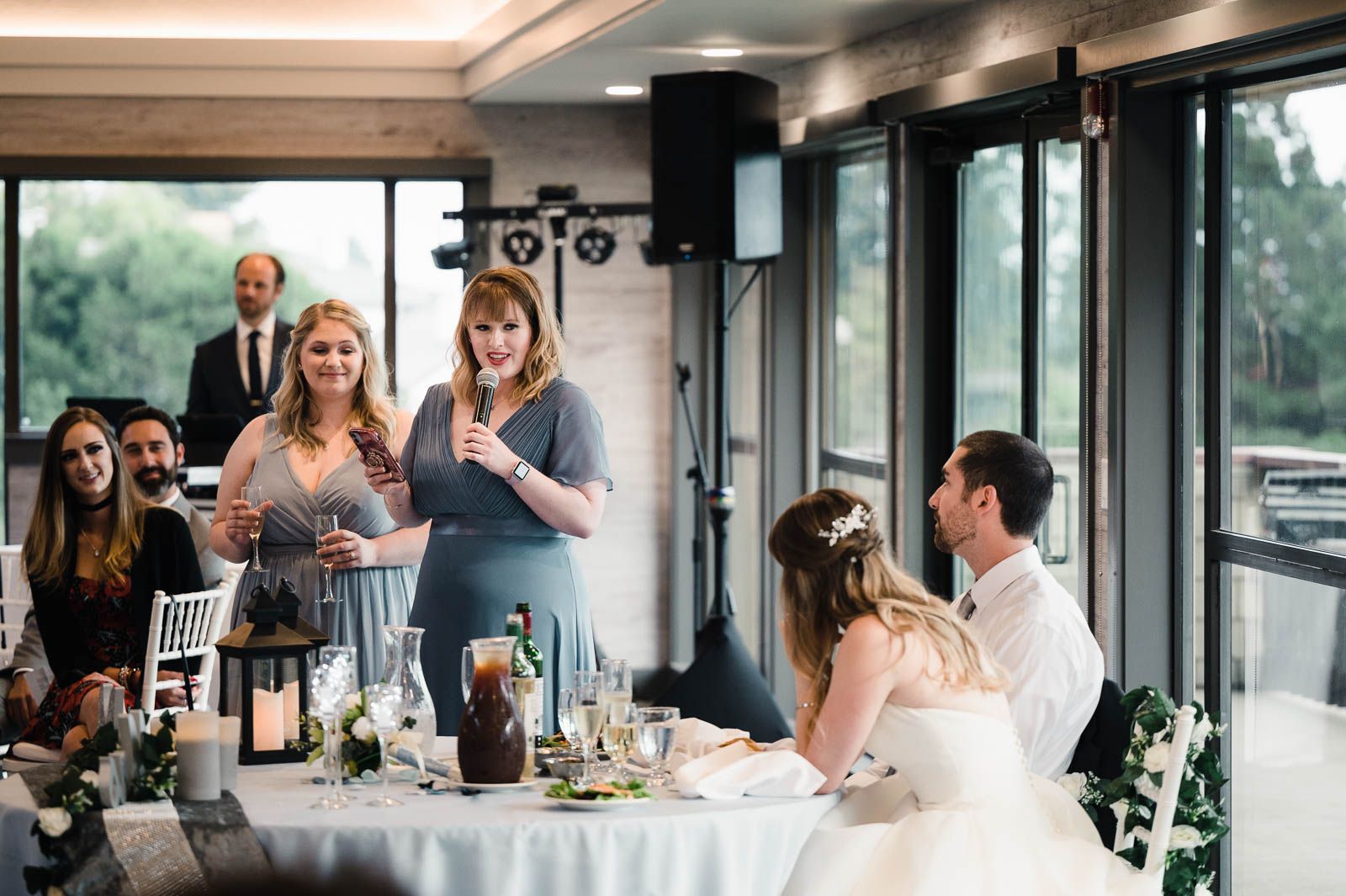 maid of honor and sister of bride gives a toast