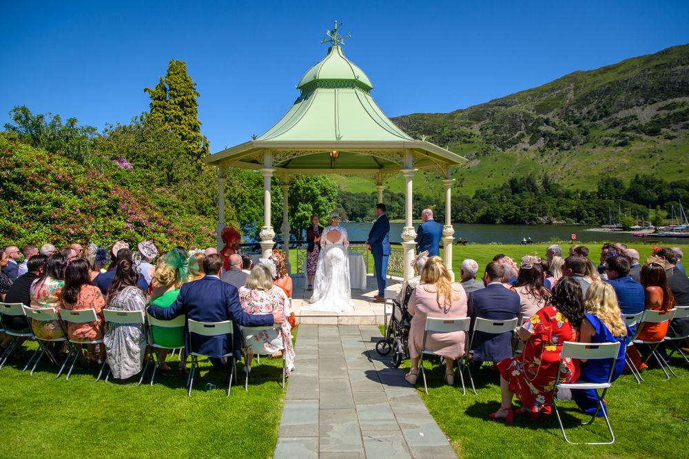 Outdoor ceremony under gazebo at Inn on the Lake
