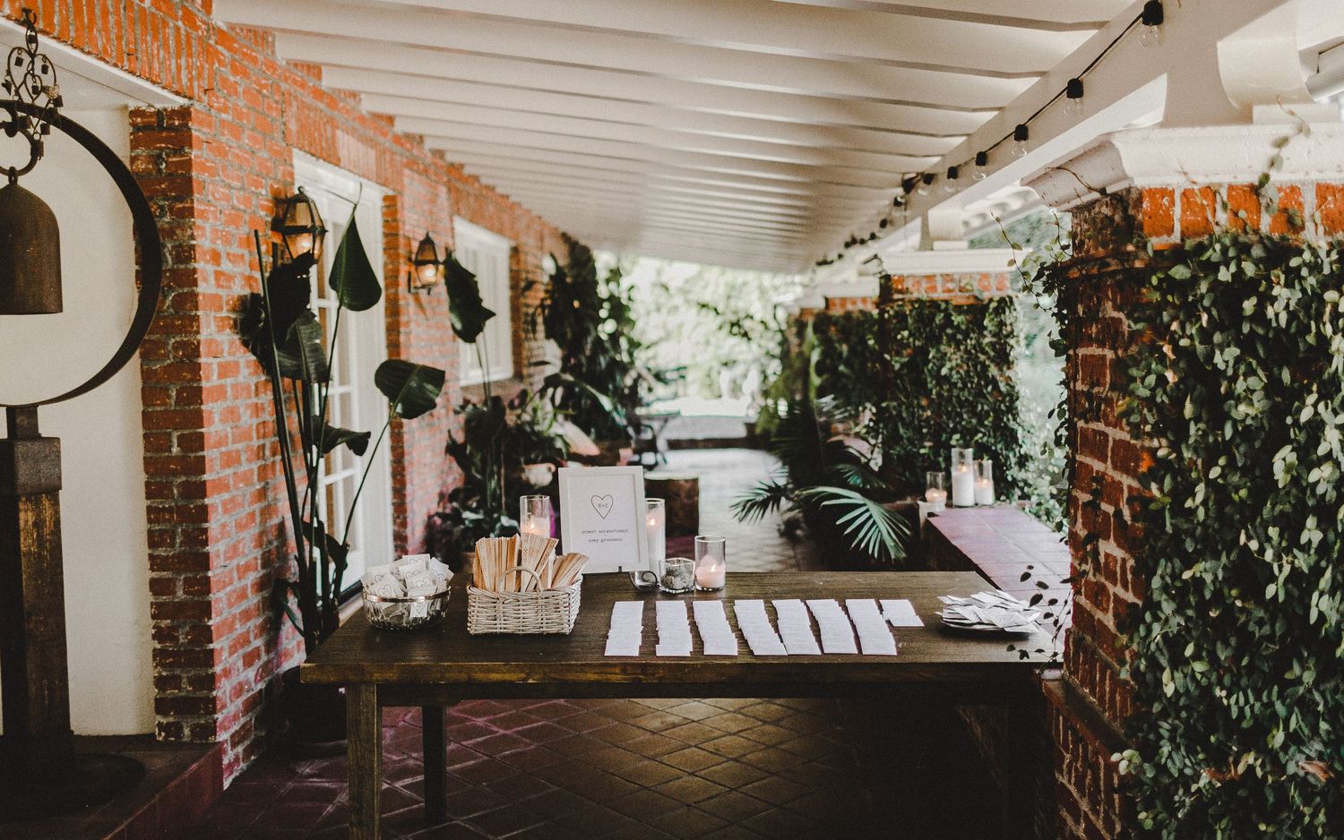 wide shot of welcome table at robert and zoey's wedding