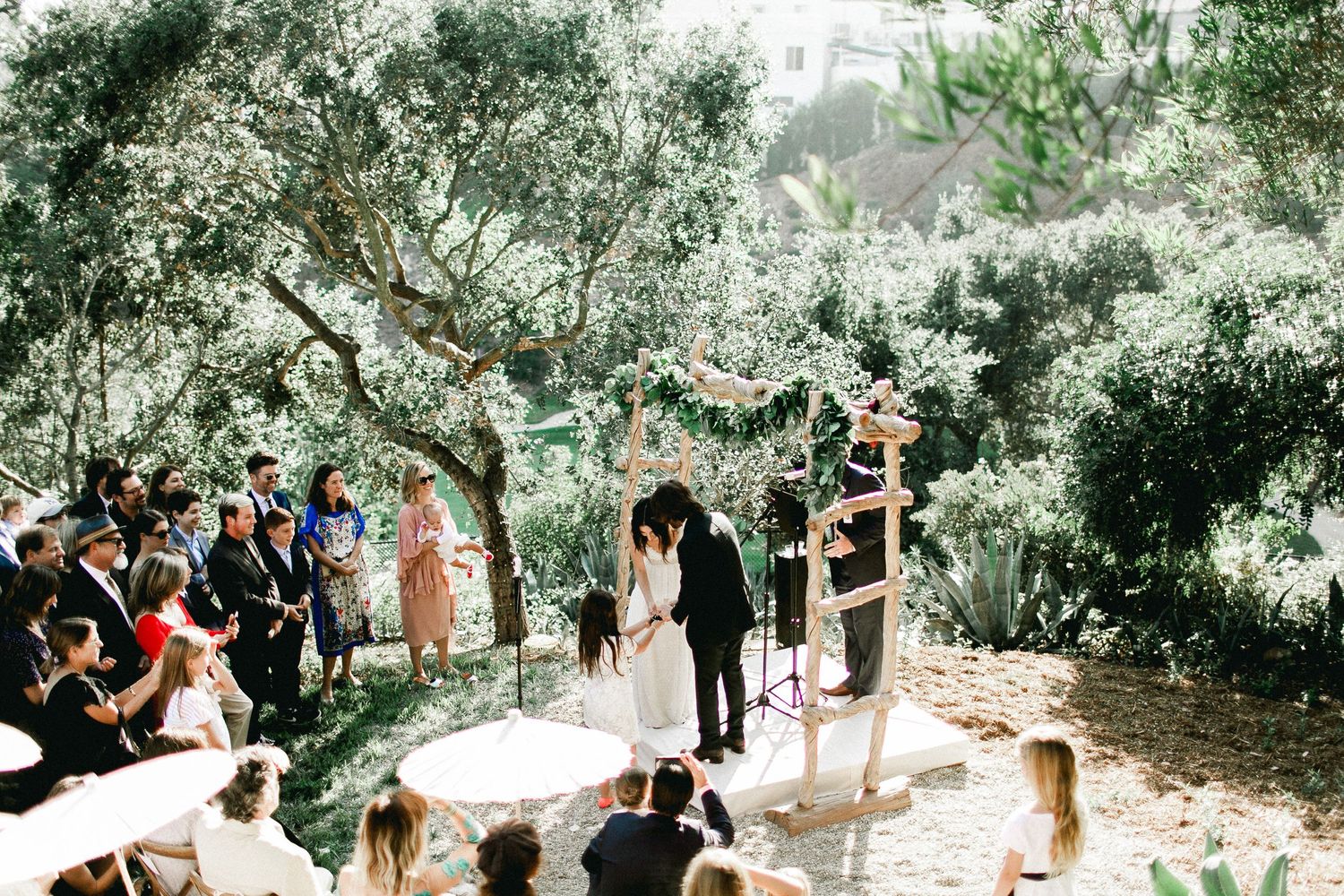 bride and groom receiving rings