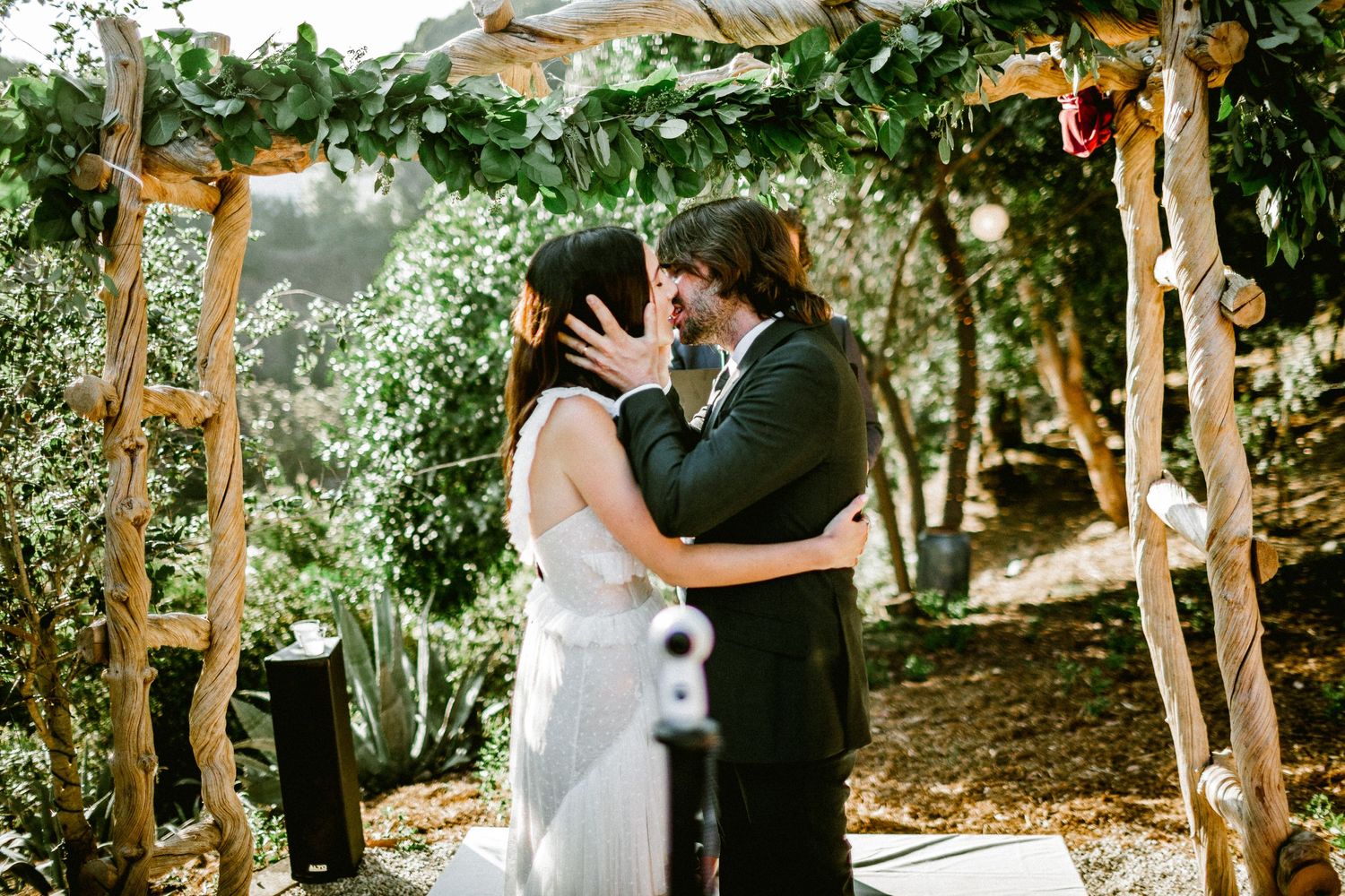bride and groom first kiss as husband and wife