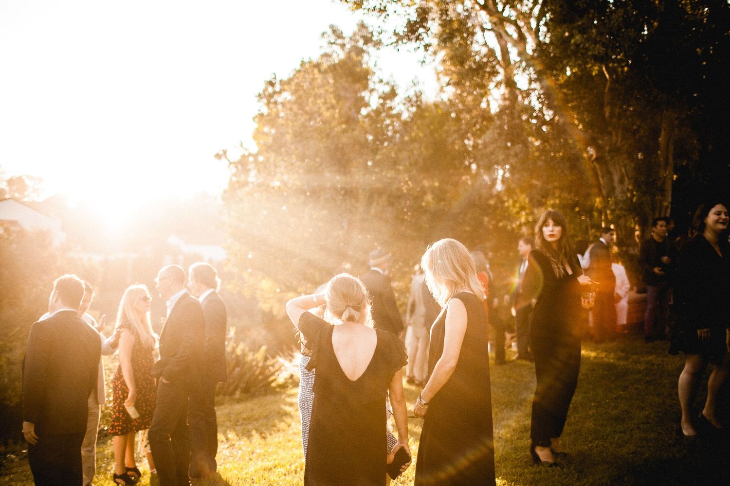 cocktail hour golden hour with guests mingling