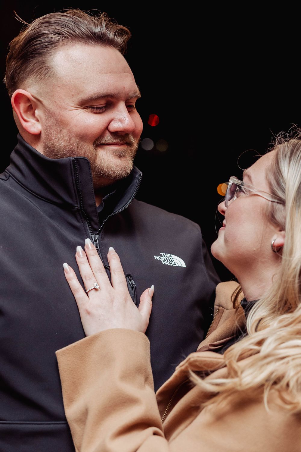 An intimate close-up moment shared between a couple showing genuine emotion.